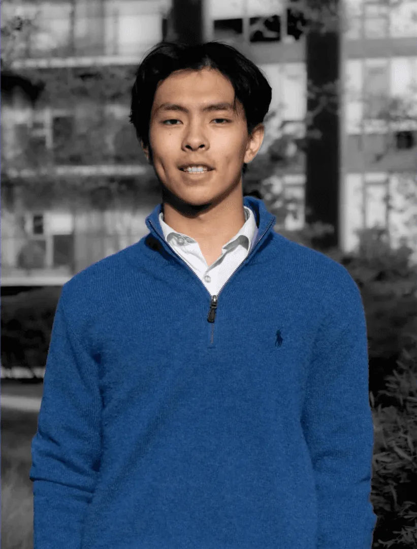 Roy L., Young Guns alumnus and USC student, in a blue sweater